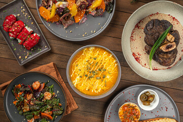 Restaurant table served with different german dishes