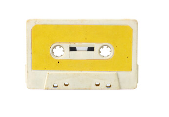 Fototapeta premium The yellow vintage Compact Audio Cassette isolated on white background.