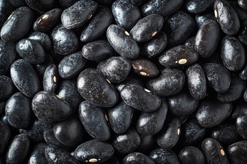 Glossy black stones with smooth surface and rounded shapes