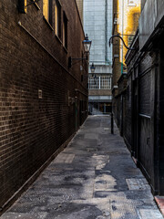Fototapeta premium A mysterious, grimy and hidden old back alley in London