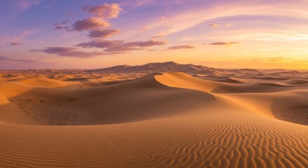 Desert Sand Dunes Landscape at Sunset with Dramatic Sky and Mountains