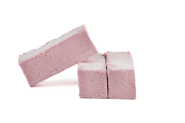 Close-up of sweet fruit cranberry marshmallows in the form of bars on a white background.