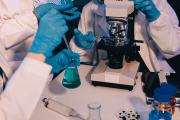 Chemists in a lab developing cosmetic products, testing and analyzing formulas for quality and effectiveness.