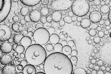 Close-up macro bubble texture,Close up macro Aloe vera gel serum cosmetic texture blue background...