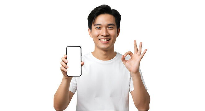 Smiling man showing smartphone with empty screen and doing okay sign