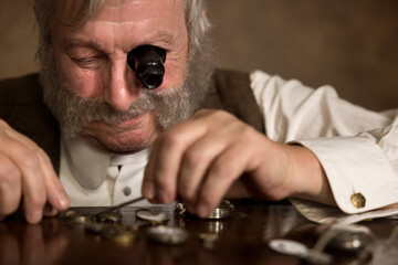 Victorian watchmaker with eyepiece