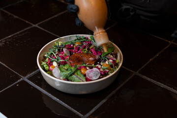 specially prepared salad served, fine dining