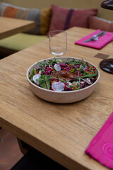 specially prepared salad served, fine dining