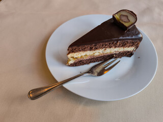 Delicious chocolate cake with rum candy in prague restaurant copy space