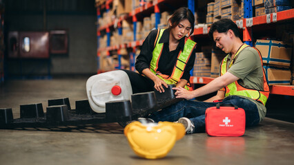 Warehouse worker has an accident from falling from a height while working in a factory.