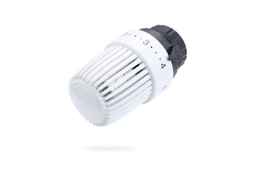 Temperature control knob for home heating system white color isolated on white background.