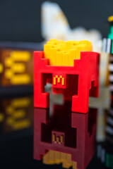 Fototapeta premium Bangkok, Thailand - April 6, 2025 : Fry Helmet Minecraft from McDonald, Toy form Minecraft blind box from McDonald's collaborates Minecraft the movice