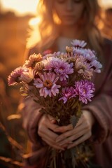 Smiling Woman with Purple Wildflowers at Golden Hour.
