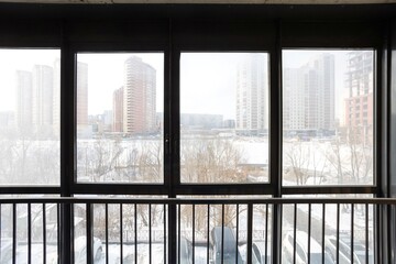 Fototapeta premium the balcony of an apartment on the upper floors of an apartment building