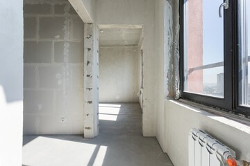 the balcony of an apartment on the upper floors of an apartment building