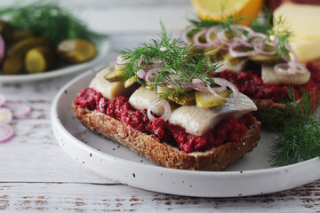 Scandinavian sandwiches with herring and beetroot	