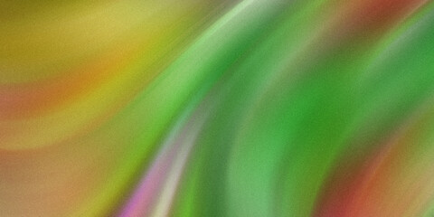 Obraz premium Abstract blurred image showing flowing shades of green yellow and pink with soft transitions