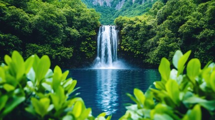 Naklejka premium A beautiful waterfall cascades into a calm blue pool surrounded by a lush green forest.