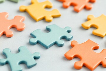 Obraz premium close-up of colorful puzzle pieces scattered copy space