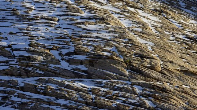Winter landscape of Zion National Park showcasing snow-covered cliffs and clear blue skies, Zion National Park, Utah