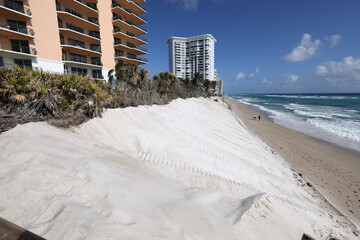 In anticipation of adding a sea wall on oceanfront property, a sand replenishment project was done to mitigate beach erosion.
