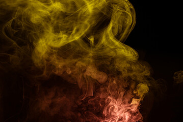Yellow and pink steam on a black background.