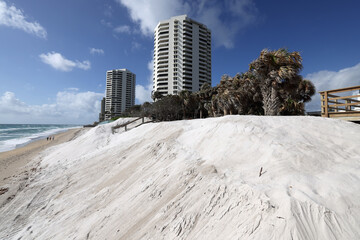 In anticipation of adding a sea wall on oceanfront property, a sand replenishment project was done to mitigate beach erosion.