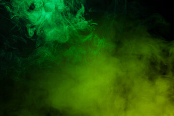 Green and pink steam on a black background.