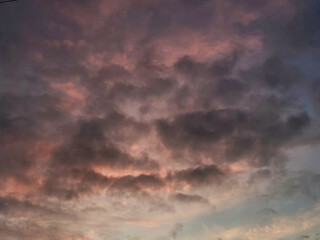 Dark stormy evening sky at sunset.