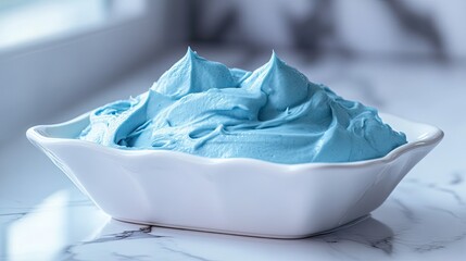 Dreamy blue cream with a thick consistency in a modern serving dish.