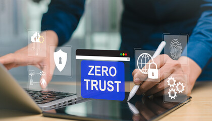 Zero Trust Security Concept, Businessman using laptop and tablet for strictly verify credentials of...