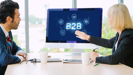 Business person navigates B2B landscape, harness technology to enhance business-to-business...