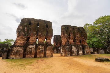 Fototapeta premium The ruins of the Royal Palace of King Parakramabahu in the Ancient City of Polonnaruwa, a UNESCO World Heritage Site in Sri Lanka, showcasing ancient architecture.
