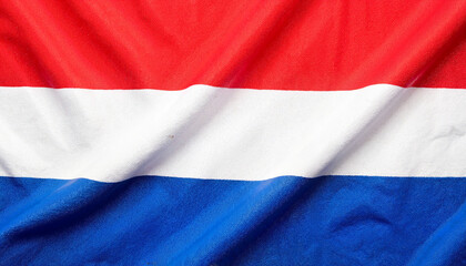 Obraz premium Dutch flag fabric texture in red, white, and blue colors 