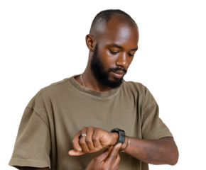 Focused man checking time on his wristwatch against black background. The importance of punctuality and time management showcased elegantly.