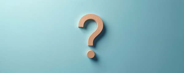 Naklejka premium Wooden question mark on light blue background. Symbol of inquiry, uncertainty, solution. Concept of asking questions, seeking answers, solving problems, business, education, support, communication,