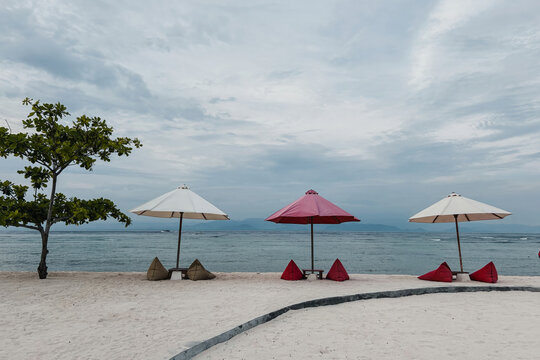 Sandy beach with umbrellas on sandy beach