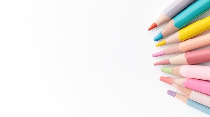 Colorful pencils arranged in a circle on a white background