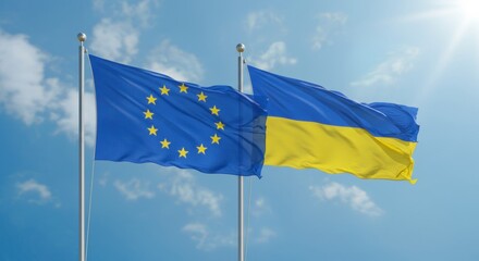 National Flags of the European Union and Ukraine Flying Side by Side Against a Clear Blue Sky
