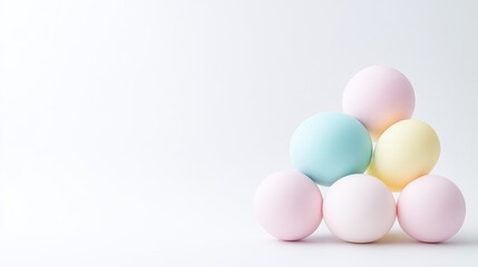 Fototapeta premium Pastel-colored spheres arranged in a triangle