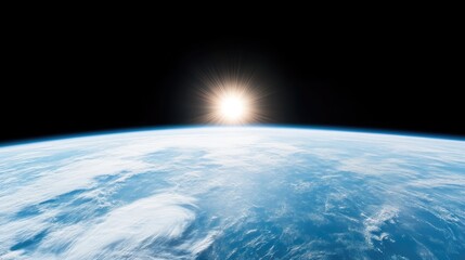 Fototapeta premium The image shows Earth from space, a vibrant blue and white sphere. The sun rises on the horizon, creating a radiant glow. The composition is simple, focusing on the planet. High resolution, with ex