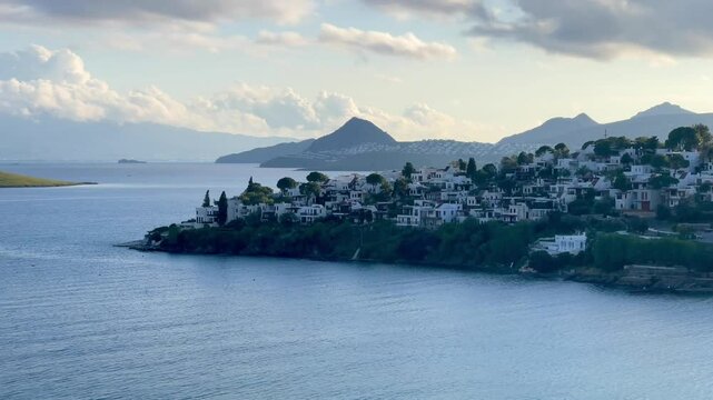 Blue sea, islands and boats on the Aegean coast. Summer vacation and coastal nature concept
