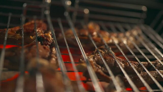 Meat is cooked on the grill, mutton on the grill, the process of cooking mutton on the grill