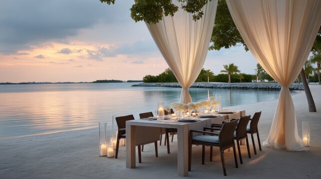 Luxury events gala dinner and elegant decor, A serene outdoor dining setup by the water, featuring an elegant table and chairs, illuminated by candles, with a beautiful sunset in the background.