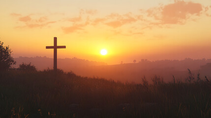 A simple cross stands silhouetted against a glorious sunset, symbolizing faith and hope against a beautiful natural backdrop of rolling hills and golden light.