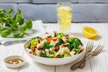 Italian Broccoli Cauliflower Salad in a white bowl