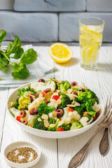 Italian Broccoli Cauliflower Salad in a white bowl