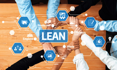 A diverse team collaborating around a table, showcasing lean management principles with a focus on...