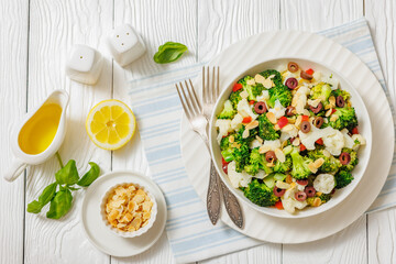 Italian Broccoli Cauliflower Salad in a white bowl