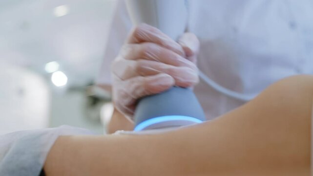 Close-Up: Wellness Therapist Uses High-Tech Device for Abdominal Massage